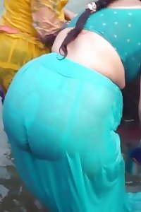 bhabis bathing outdoor